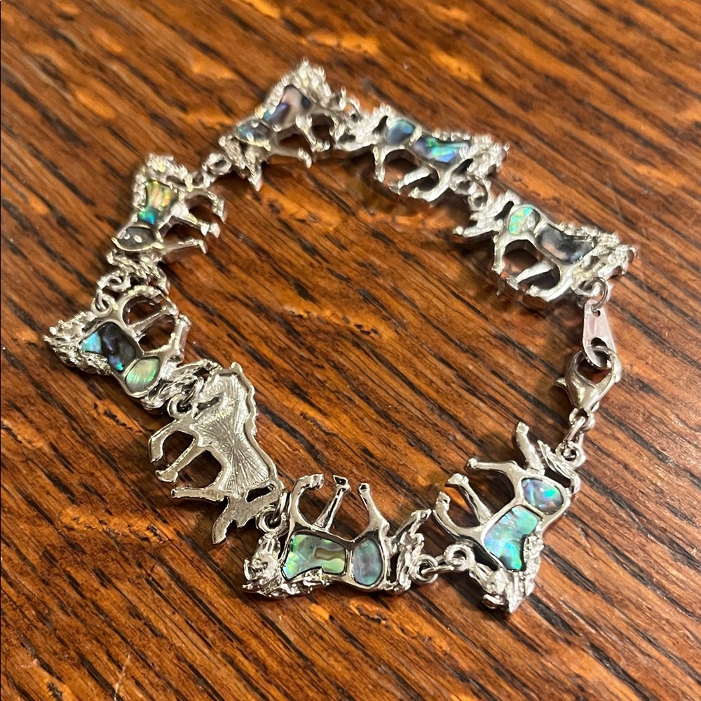 Stunning Silver Horse Bracelet with Abalone Accents